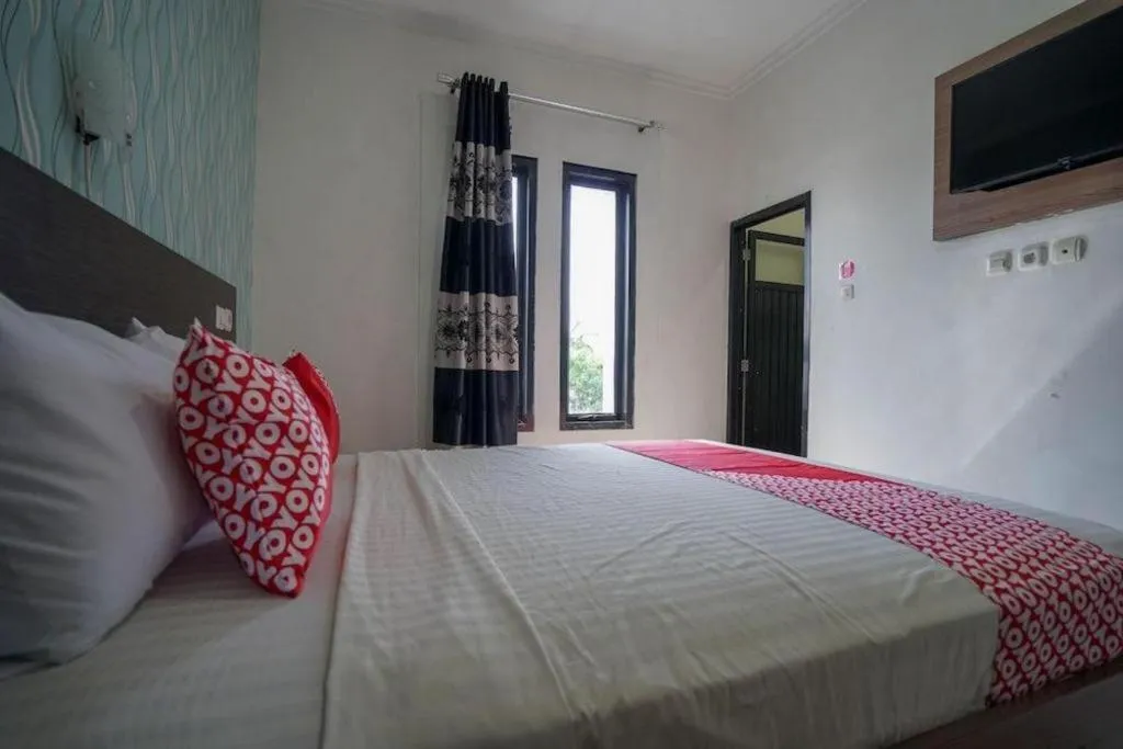 Bed in Hotel O Green Palm Kostel Syariah