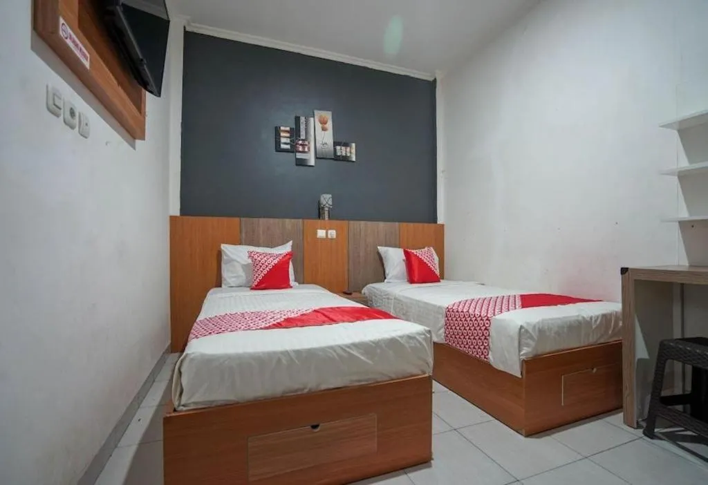 Bed in Hotel O Green Palm Kostel Syariah