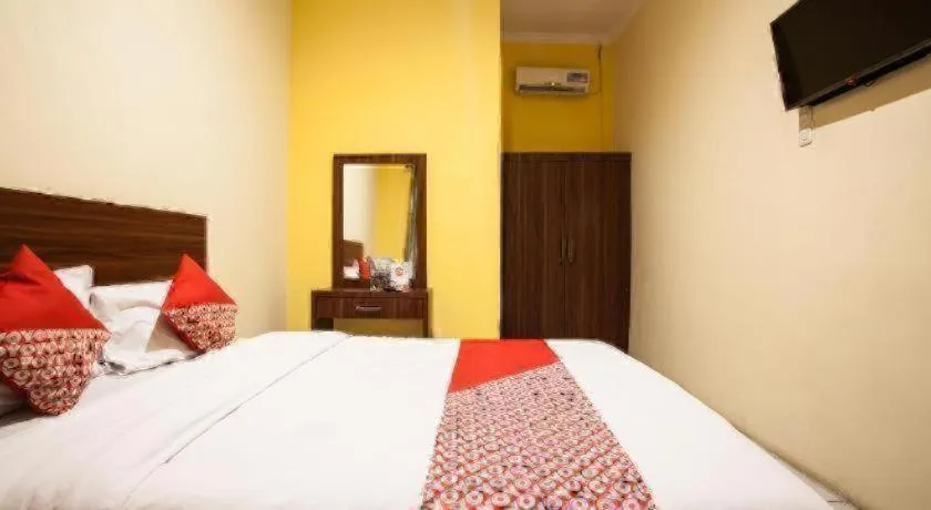 Bed in Hotel O Bunga Raya Residence