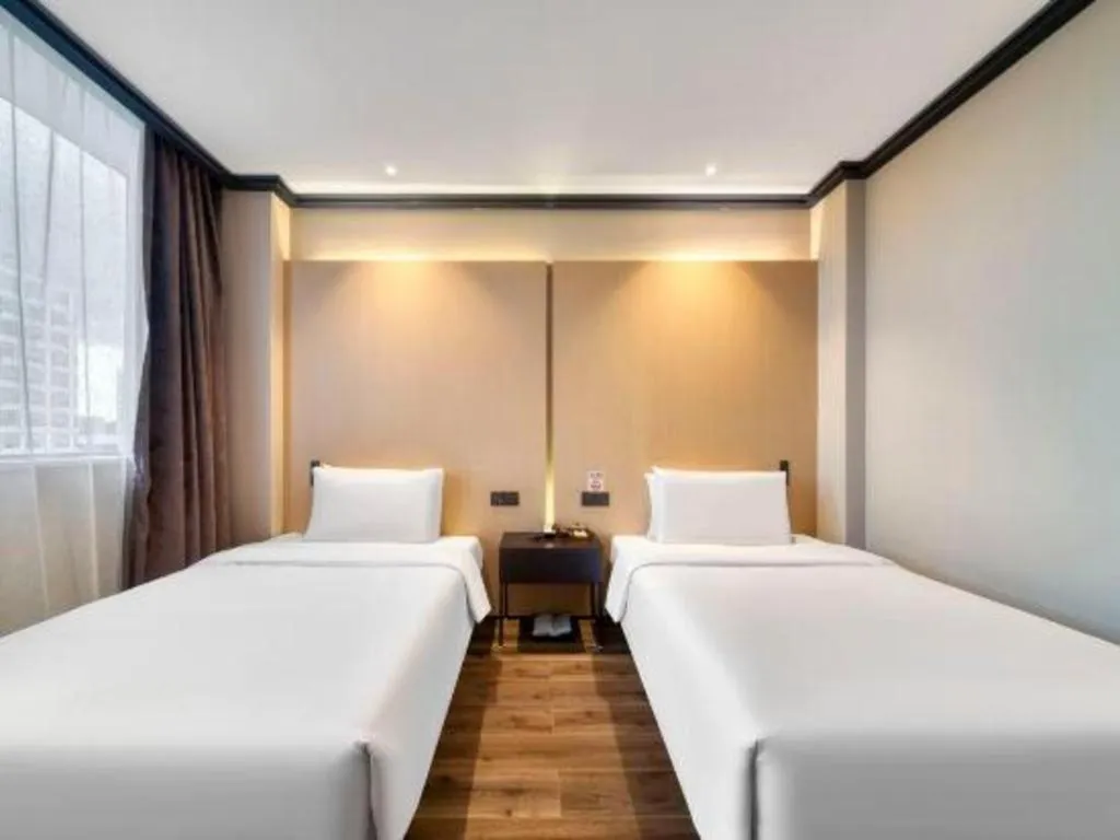 Bed in Atour Light Hotel Hangzhou Future Sci-Tech City