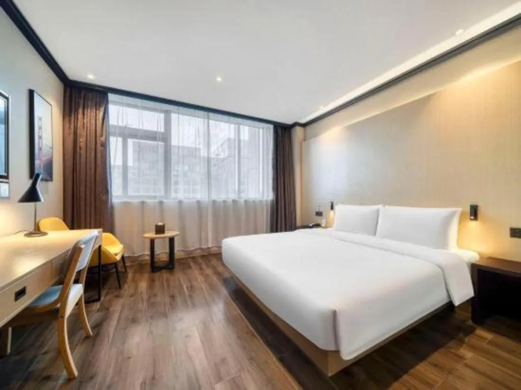 Bed in Atour Light Hotel Hangzhou Future Sci-Tech City