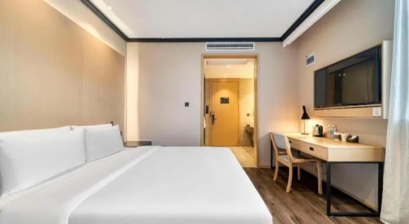 Bed in Atour Light Hotel Hangzhou Future Sci-Tech City