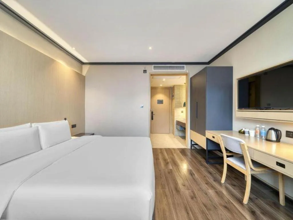 Bed in Atour Light Hotel Hangzhou Future Sci-Tech City