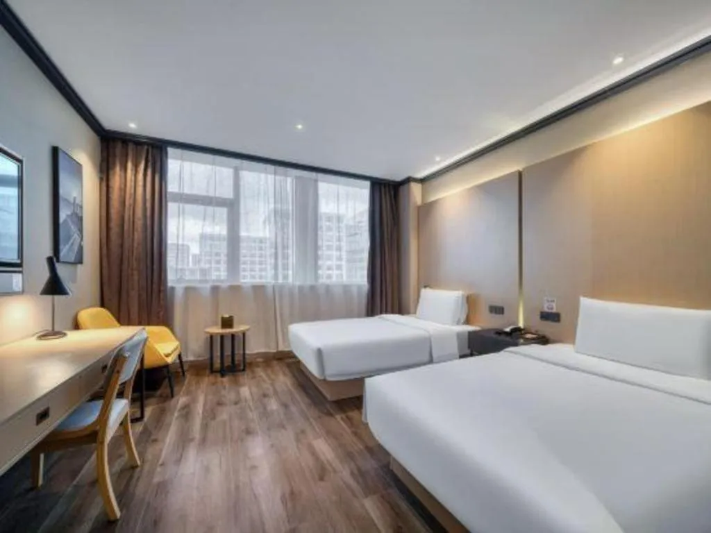 Bed in Atour Light Hotel Hangzhou Future Sci-Tech City