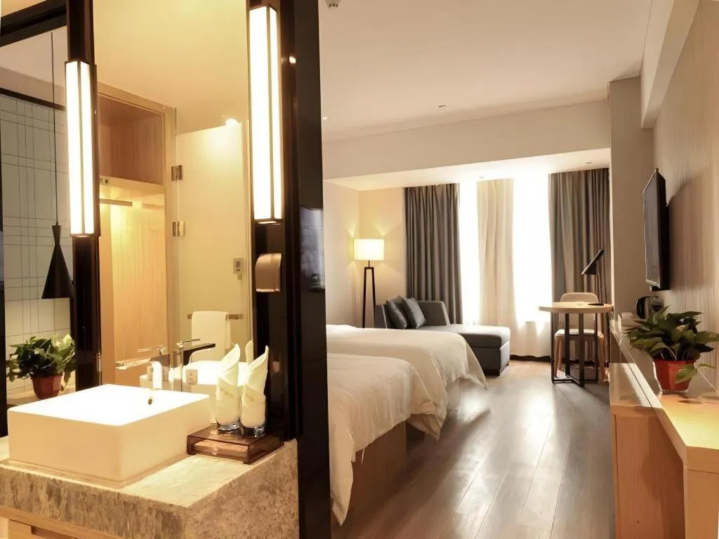 Bed in GreenTree Eastern Hotel Hunan Changsha Xinsha Luositang Metro Station