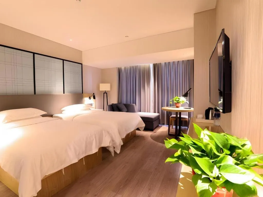 Bed in GreenTree Eastern Hotel Hunan Changsha Xinsha Luositang Metro Station