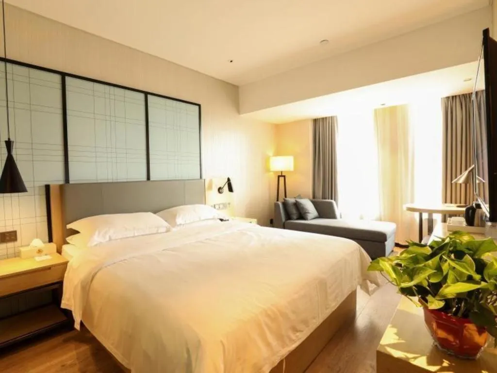 Bed in GreenTree Eastern Hotel Hunan Changsha Xinsha Luositang Metro Station