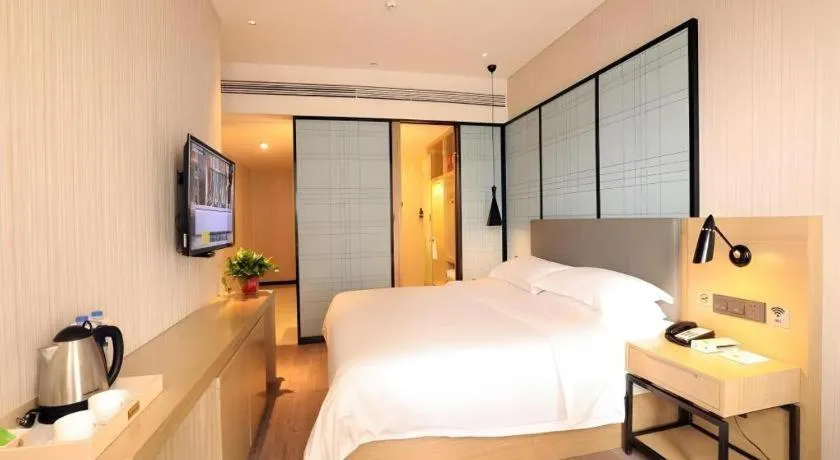 Bed in GreenTree Eastern Hotel Hunan Changsha Xinsha Luositang Metro Station