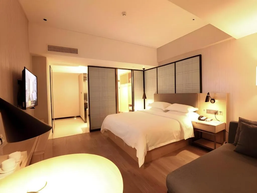 Bed in GreenTree Eastern Hotel Hunan Changsha Xinsha Luositang Metro Station