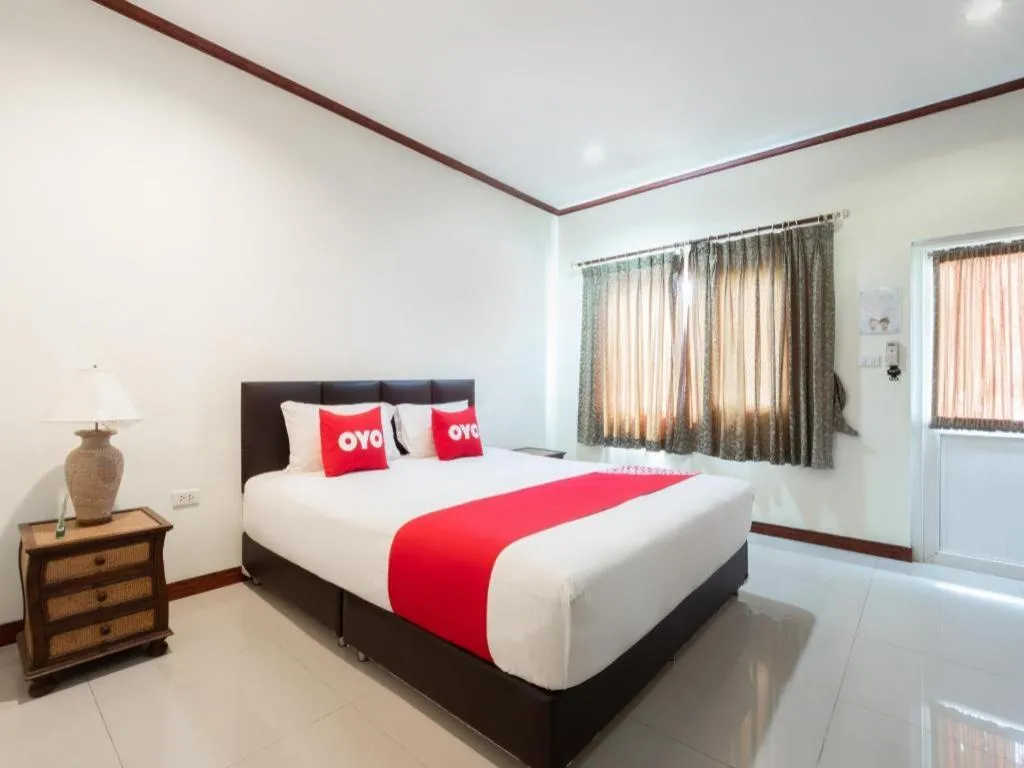 Bed in OYO 1131 Rendezvous Resort & Restaurant
