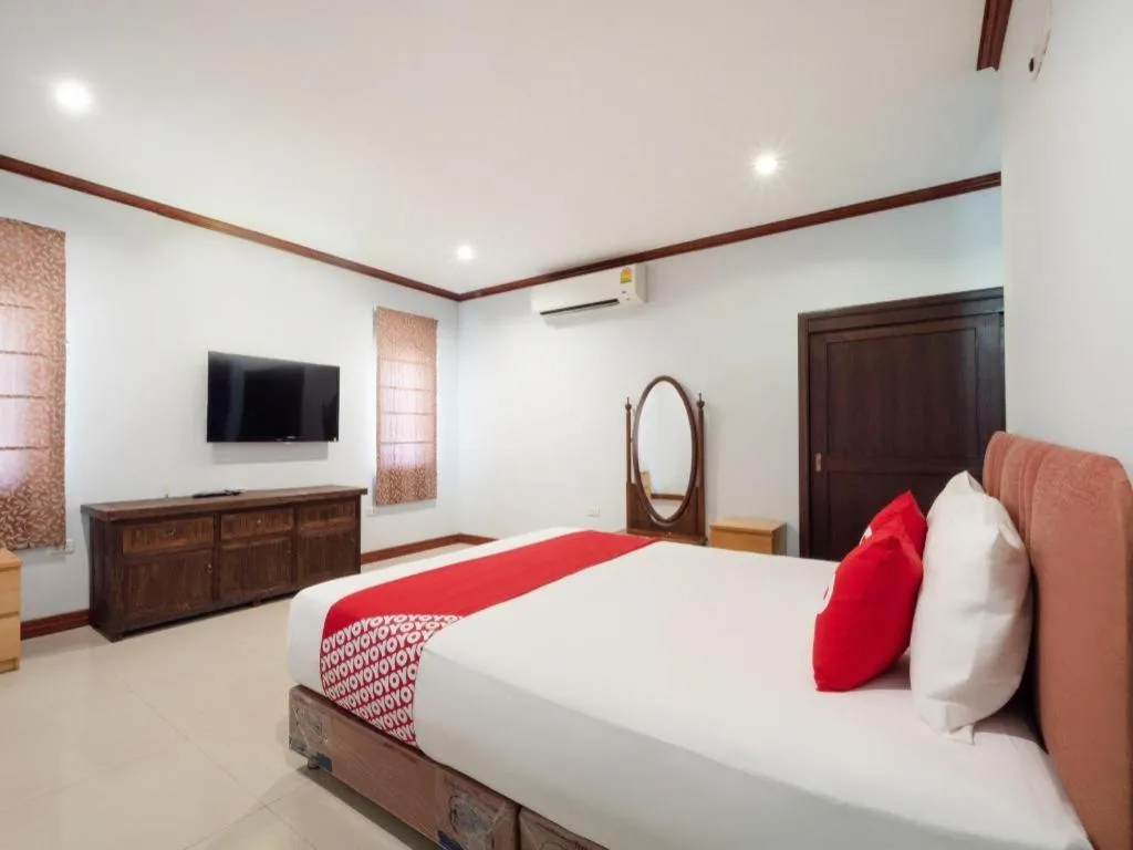 Bed in OYO 1131 Rendezvous Resort & Restaurant