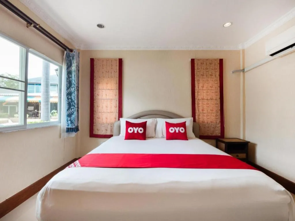 Bed in OYO 1131 Rendezvous Resort & Restaurant