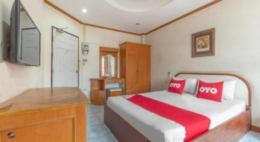 Bed in OYO 1125 Chokdee Inn