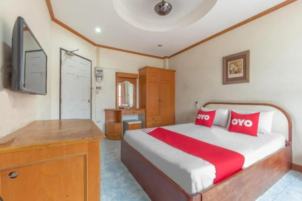 Bed in OYO 1125 Chokdee Inn