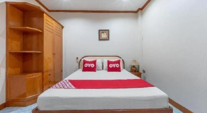 Bed in OYO 1125 Chokdee Inn