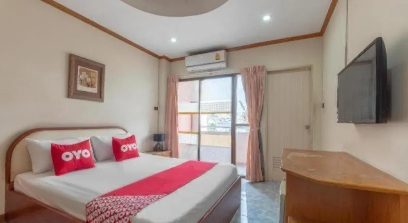 Bed in OYO 1125 Chokdee Inn