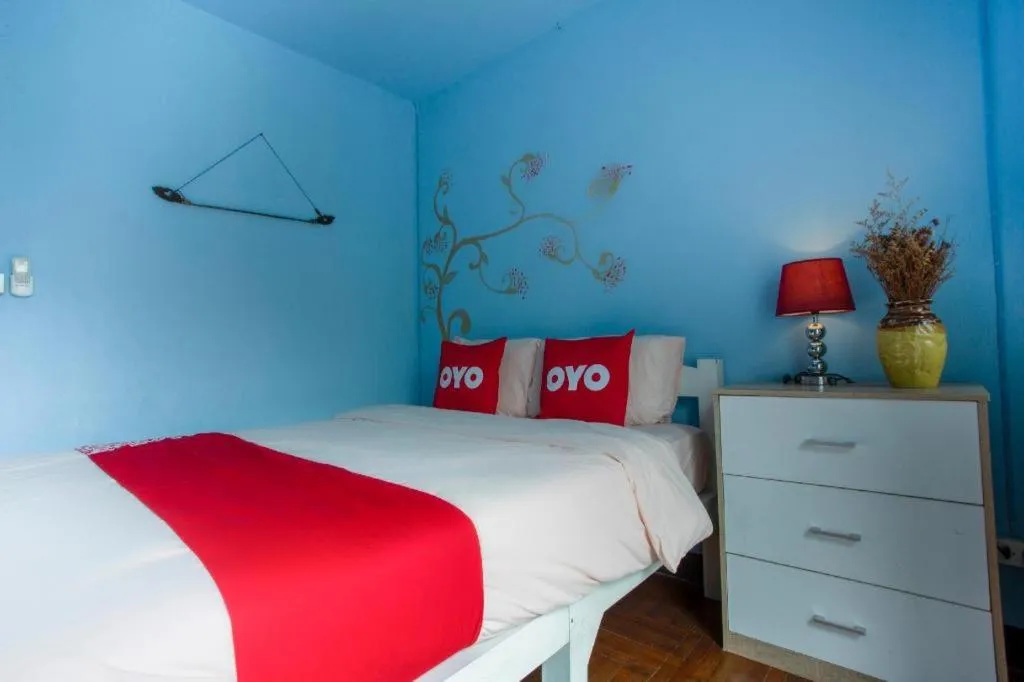 Bed in OYO 75303 V Home Guesthouse Sunday Night Market