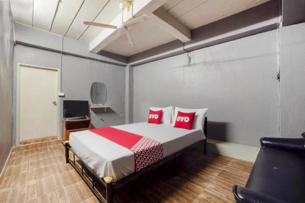 Bed in OYO 1066 Encore Sea Side