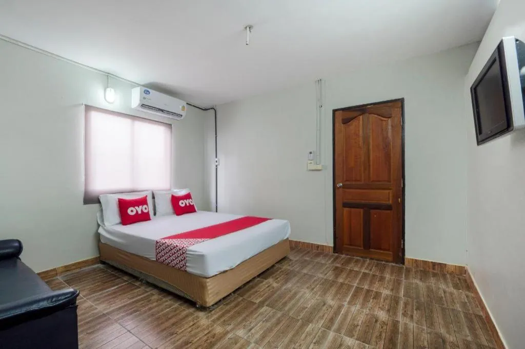 Bed in OYO 1066 Encore Sea Side