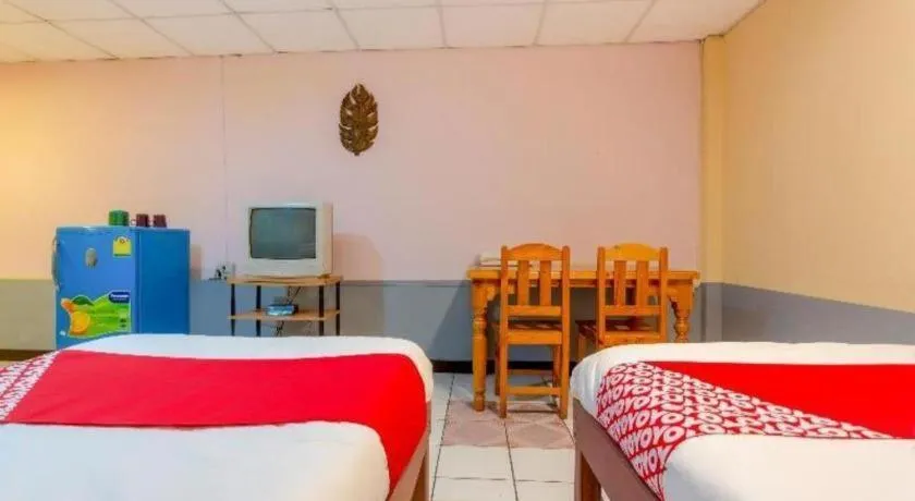 Bed in OYO 1000 Maetang Hotel