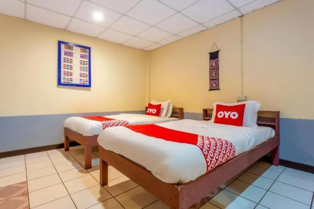 Bed in OYO 1000 Maetang Hotel