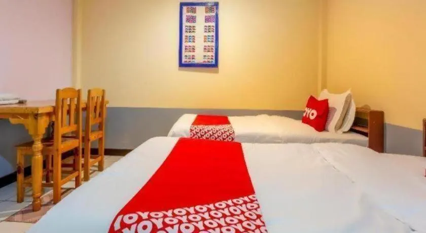 Bed in OYO 1000 Maetang Hotel