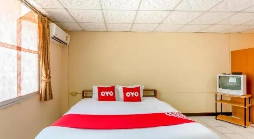 Bed in OYO 1000 Maetang Hotel