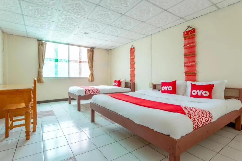 Bed in OYO 1000 Maetang Hotel