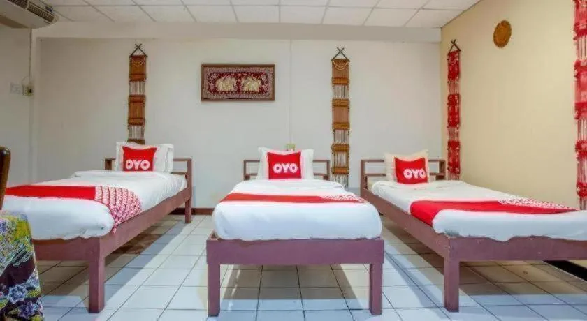 Bed in OYO 1000 Maetang Hotel