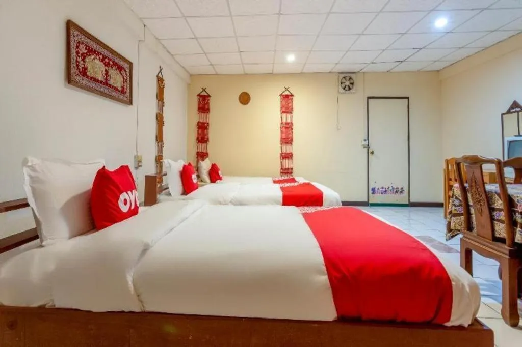 Bed in OYO 1000 Maetang Hotel