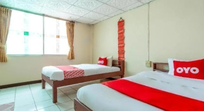 Bed in OYO 1000 Maetang Hotel
