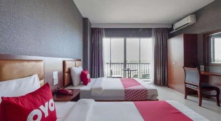 Bed in OYO 1130 CK Resort Pattaya