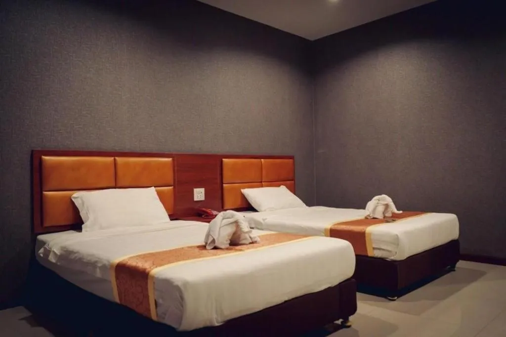 Bed in OYO 1130 CK Resort Pattaya