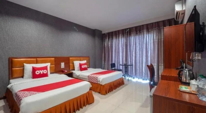 Bed in OYO 1130 CK Resort Pattaya