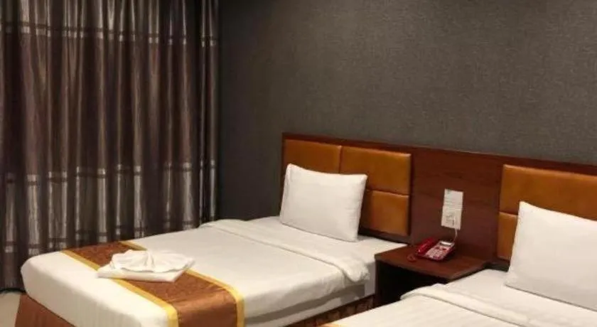 Bed in OYO 1130 CK Resort Pattaya