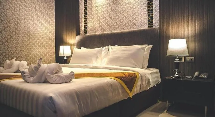 Bed in OYO 1130 CK Resort Pattaya