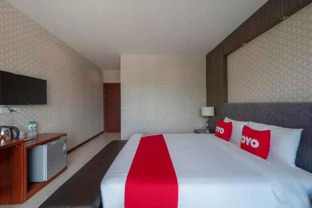 Bed in OYO 1130 CK Resort Pattaya