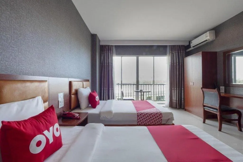 Bed in OYO 1130 CK Resort Pattaya