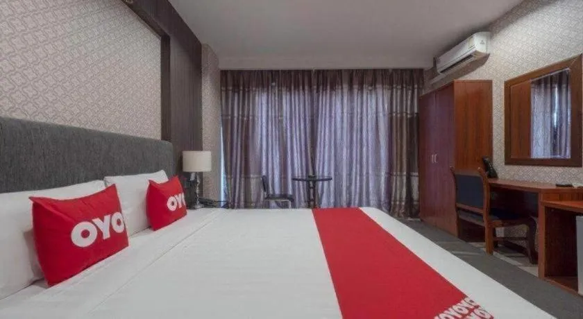 Bed in OYO 1130 CK Resort Pattaya