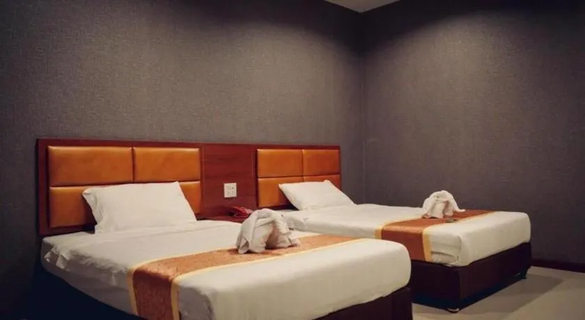 Bed in OYO 1130 CK Resort Pattaya