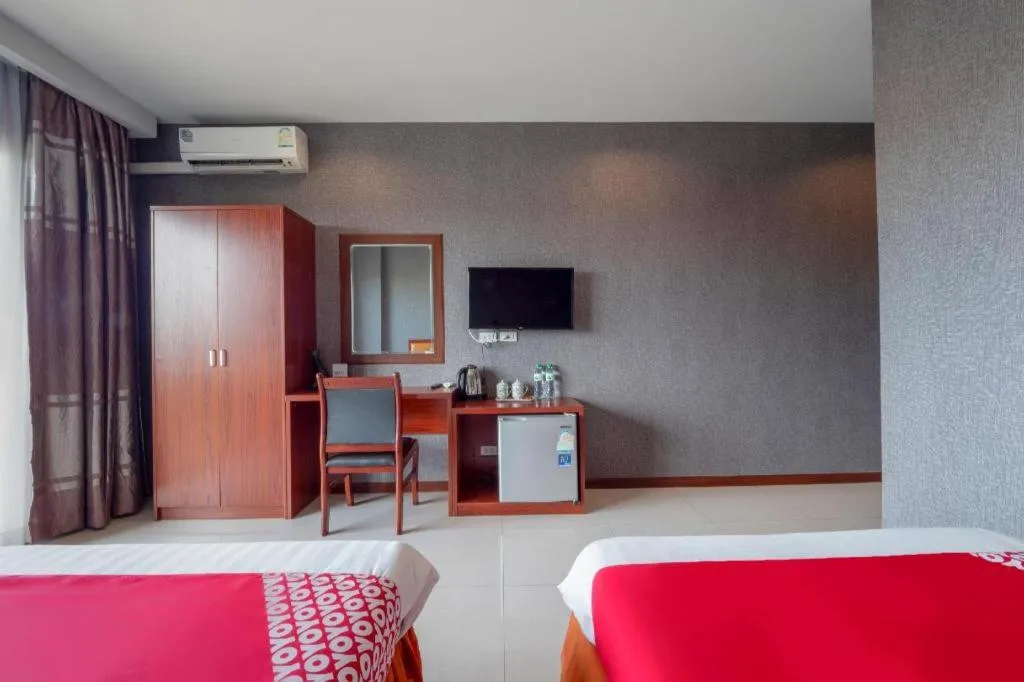 Bed in OYO 1130 CK Resort Pattaya