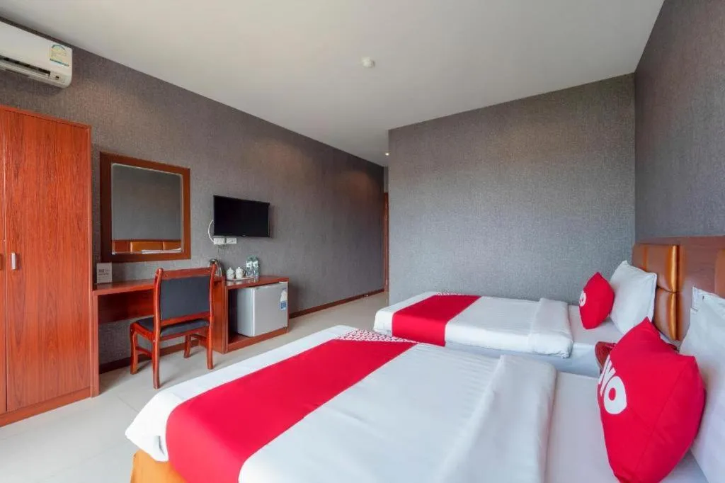 Bed in OYO 1130 CK Resort Pattaya