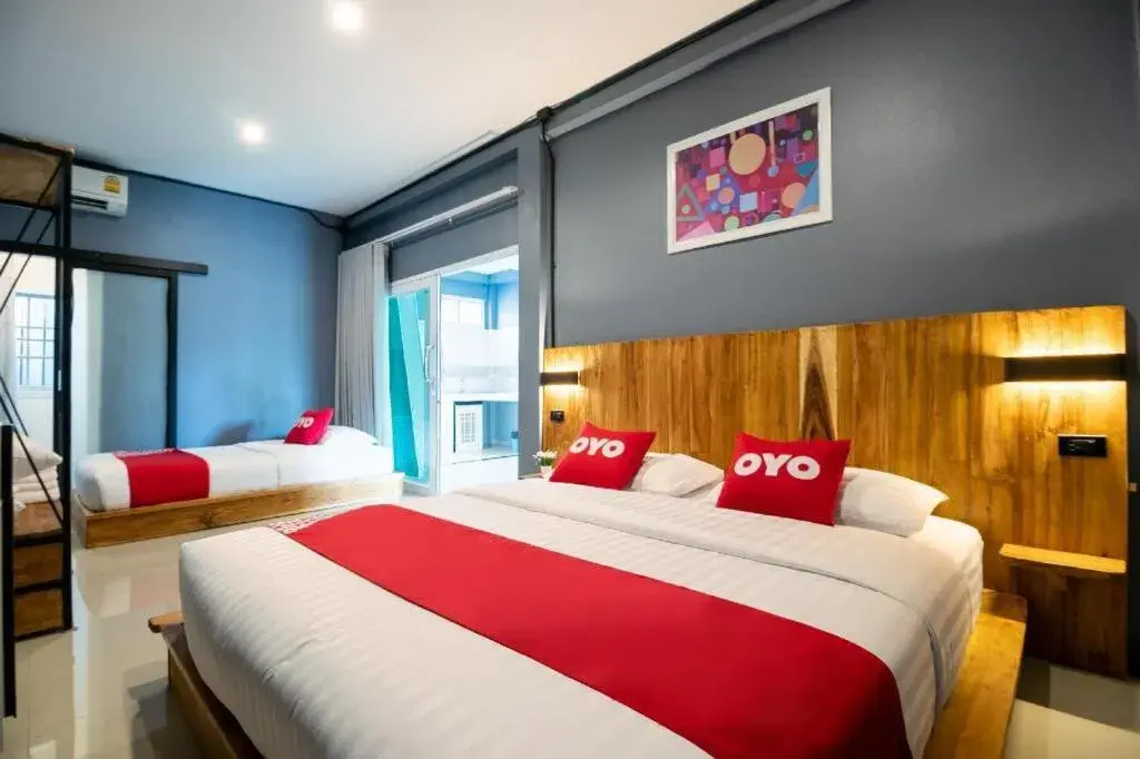 Bed in OYO 75305 T Park Pak Chong Bed in OYO 75305 T Park Pak Chong