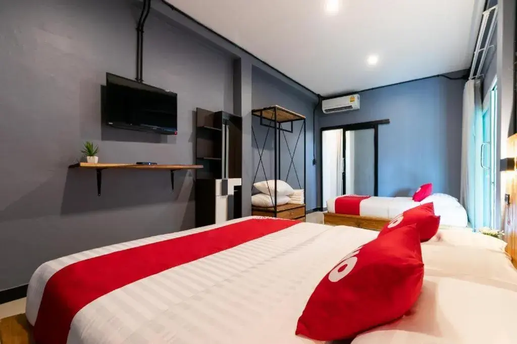 Bed in OYO 75305 T Park Pak Chong Bed in OYO 75305 T Park Pak Chong