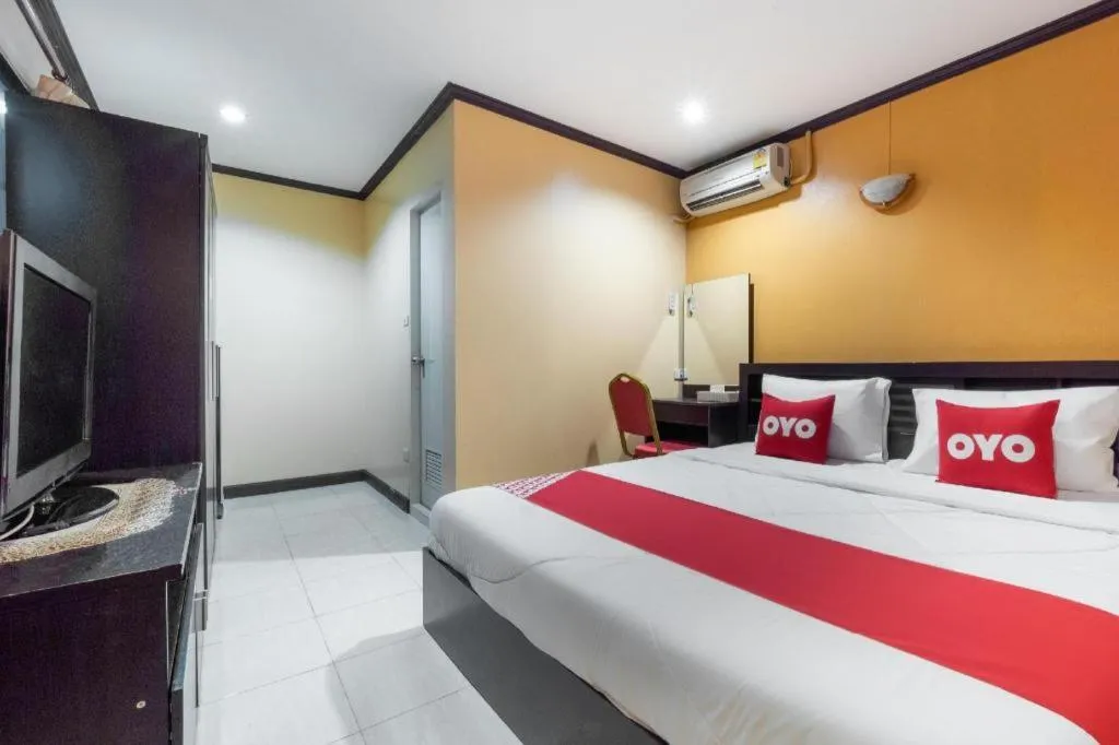 Bed in OYO 75327 Diyana Residence