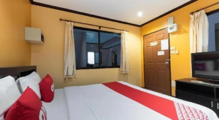 Bed in OYO 75327 Diyana Residence