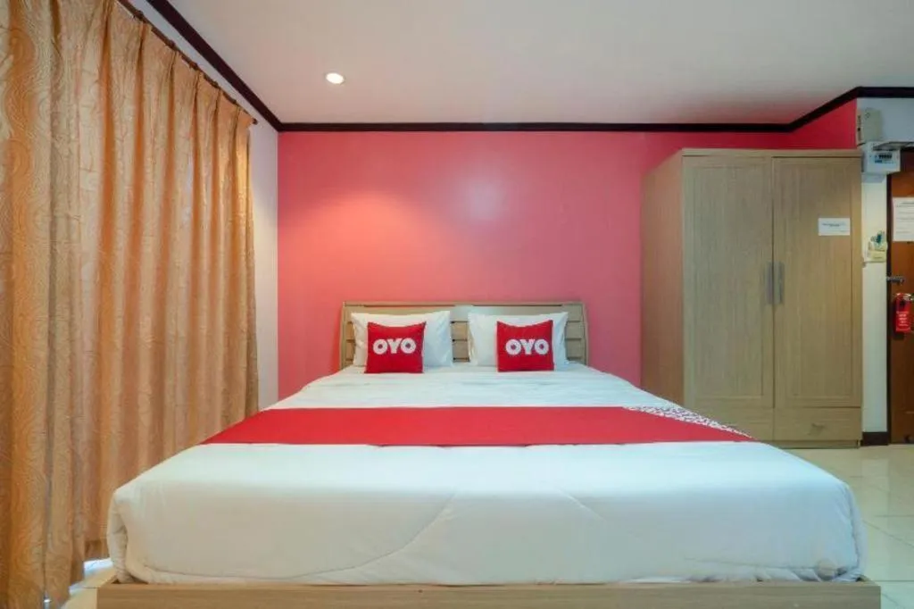 Bed in OYO 75327 Diyana Residence