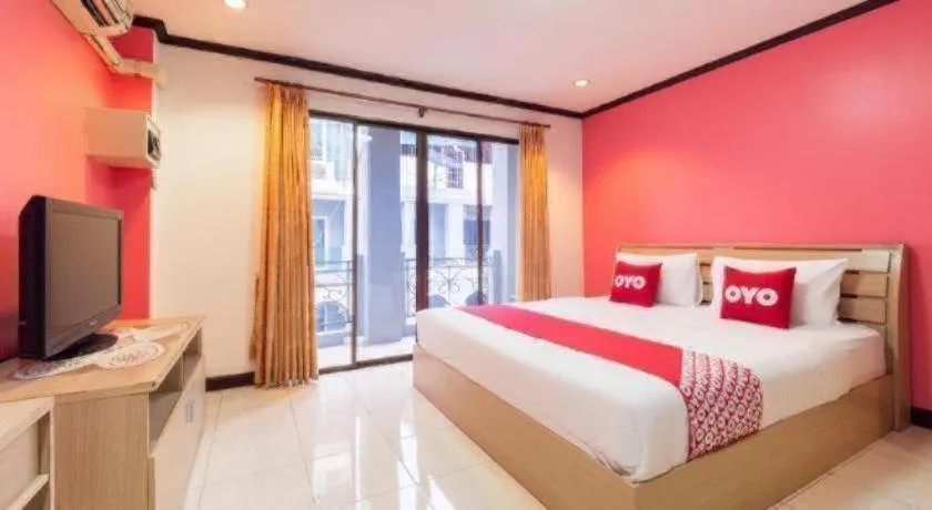 Bed in OYO 75327 Diyana Residence