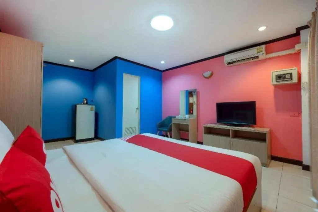 Bed in OYO 75327 Diyana Residence