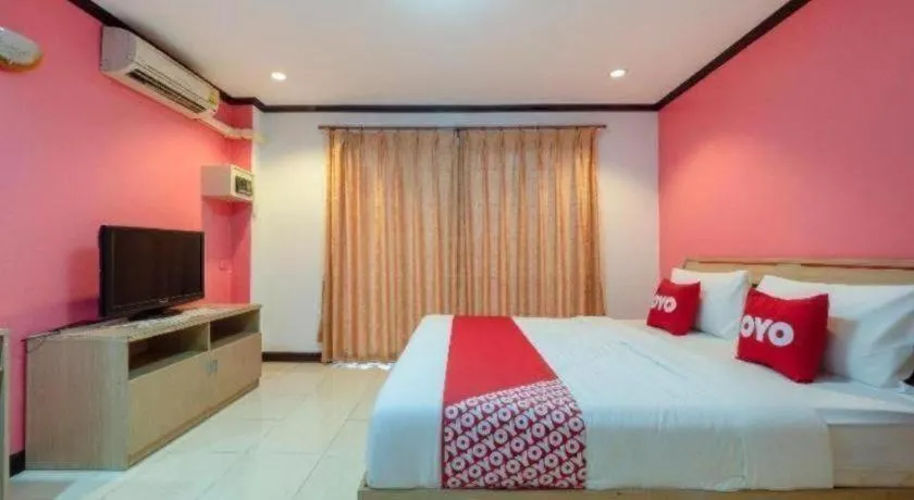 Bed in OYO 75327 Diyana Residence